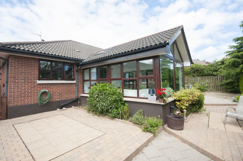 Sunroom with Brick Base